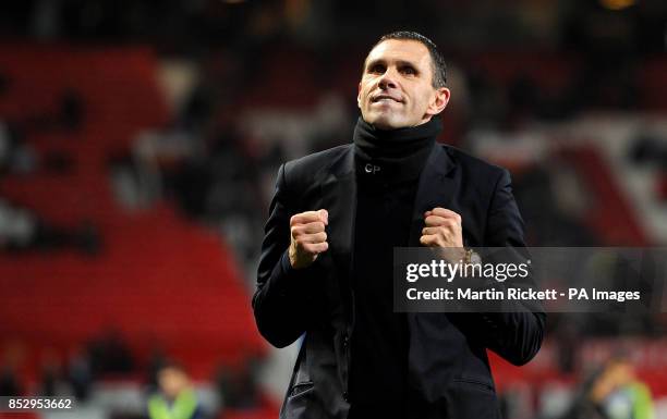 Sunderland manager Gus Poyet celebrates after his teams win during the Capital One Cup, Semi Final, Second Leg at Old Trafford, Manchester.