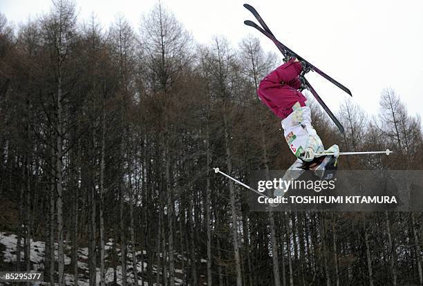 Aiko Uemura of Japan performs in the air during her final heat against compatriot Miki Ito in the women's dual mogul final rounds of the 2009 FIS...