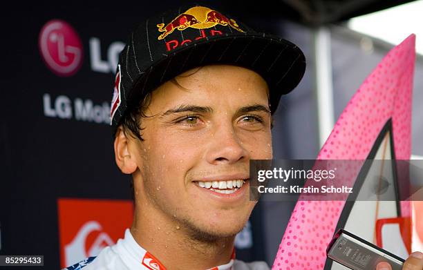 Wildcard surfer Julian Wilson of Australia smiles during a press interview after winning his Round 3 heat during the Quiksilver Pro Gold Coast...