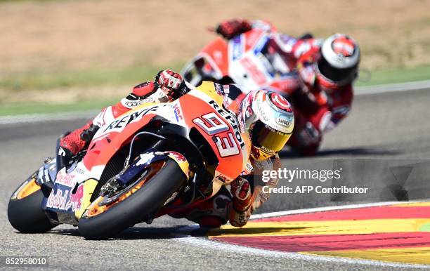 Repsol Honda Team's Spanish rider Marc Marquez rides during MotoGP race of the Moto Grand Prix of Aragon at the Motorland circuit in Alcaniz on...