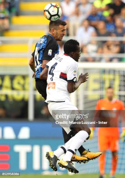 Matias Vecino of FC Internazionale competes for the ball with Isaac Cofie of Genoa CFC during the Serie A match between FC Internazionale and Genoa...