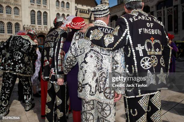 Pearly Kings and Queens pose for photos in Guildhall Yard during Harvest Festival on September 24, 2017 in London, England. The tradition of the...