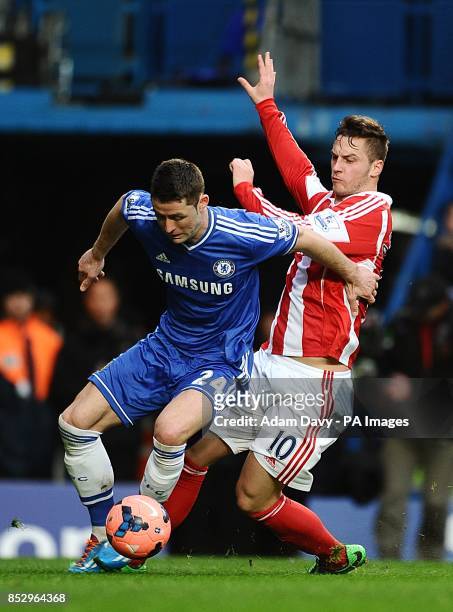 Chelsea's Gary Cahill and Stoke City's Marko Arnautovic battle for the ball