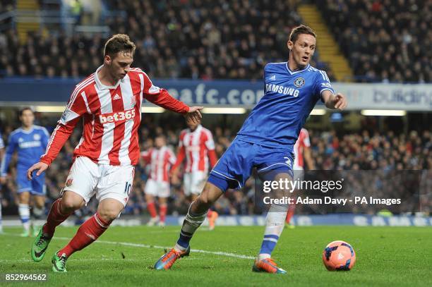 Stoke City's Marko Arnautovic and Chelsea's Nemanja Matic battle for the ball