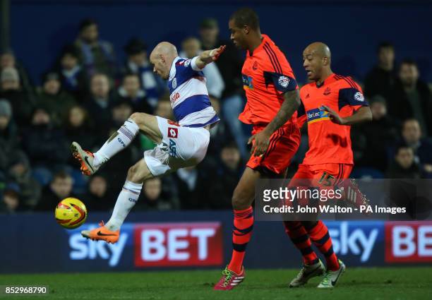 Queens Park Rangers' Andy Johnson battle for possession of the ball with Bolton Wanderers' Zat Knight during the Sky Bet Championship match at Loftus...