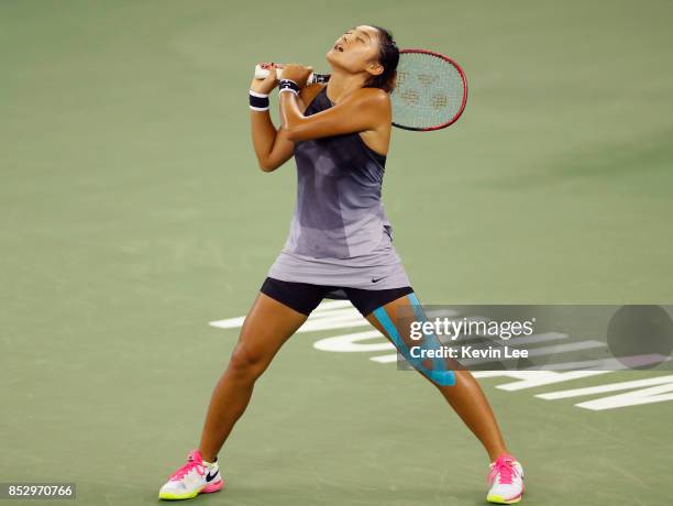 Wang Yafan of China reacts during the Ladies Singles match against Sorana Cirstea of Romania in first round on Day 1 of 2017 Wuhan Open on September...