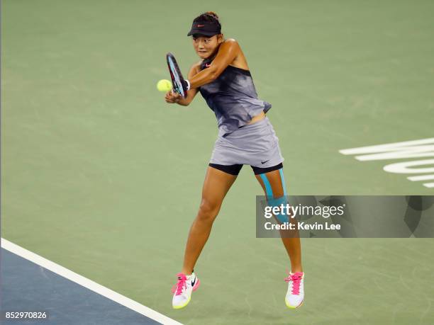 Wang Yafan of China hits a backhand during the Ladies Singles match against Sorana Cirstea of Romania in first round on Day 1 of 2017 Wuhan Open on...