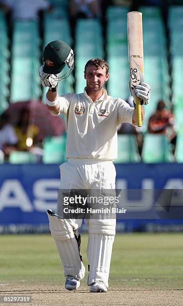 Phil Hughes of Australia celebrates his century during day three of the Second Test between South Africa and Australia played at Kingsmead on March...