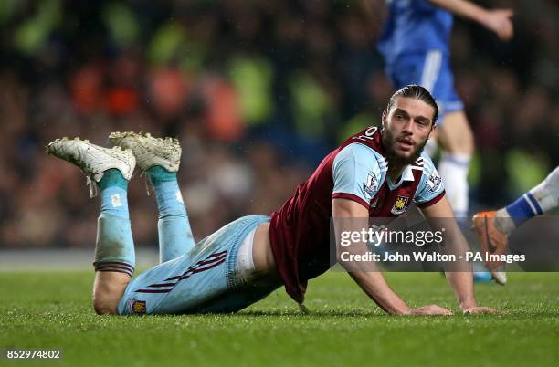 West Ham United's Andy Carroll picks himself up off the turf