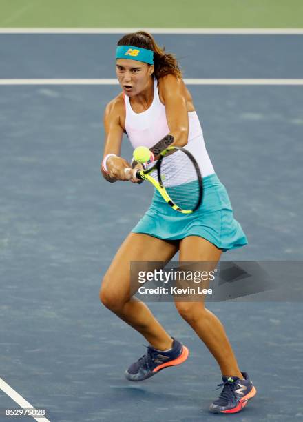 Sorana Cirstea of Romania hits a backhand during the Ladies Singles match against Wang Yafan of China in first round on Day 1 of 2017 Wuhan Open on...