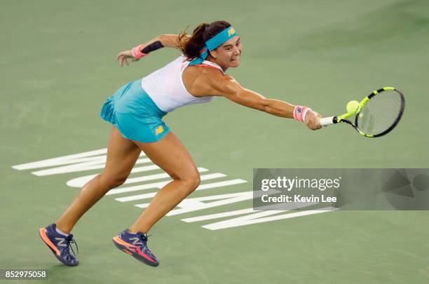 Sorana Cirstea of Romania hits a backhand during the Ladies Singles match against Wang Yafan of China in first round on Day 1 of 2017 Wuhan Open on...