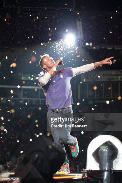 Chris Martin of Coldplay performs live on stage at CenturyLink Field on September 23, 2017 in Seattle, Washington.