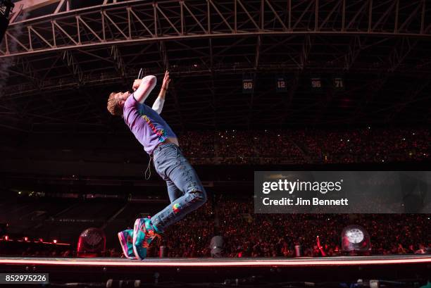 Chris Martin of Coldplay performs live on stage at CenturyLink Field on September 23, 2017 in Seattle, Washington.