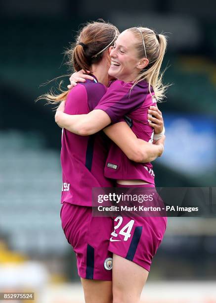 Manchester City's Jill Scott celebrates scoring her sides third goal with Keira Walsh during the FA Women's Super League at Huish Park, Yeovil.