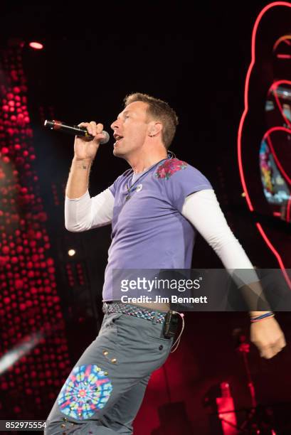 Chris Martin of Coldplay performs live on stage at CenturyLink Field on September 23, 2017 in Seattle, Washington.