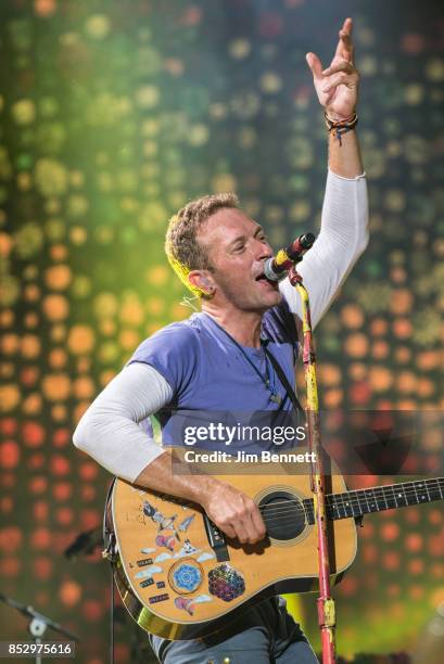 Chris Martin of Coldplay performs live on stage at CenturyLink Field on September 23, 2017 in Seattle, Washington.