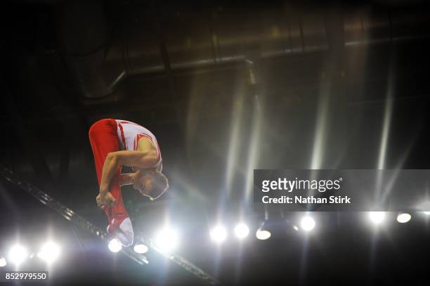 Andrew Stamp of Great Britain competes on the trampoline during the Trampoline, Tumbling & DMT British Championships at the Echo Arena on September...