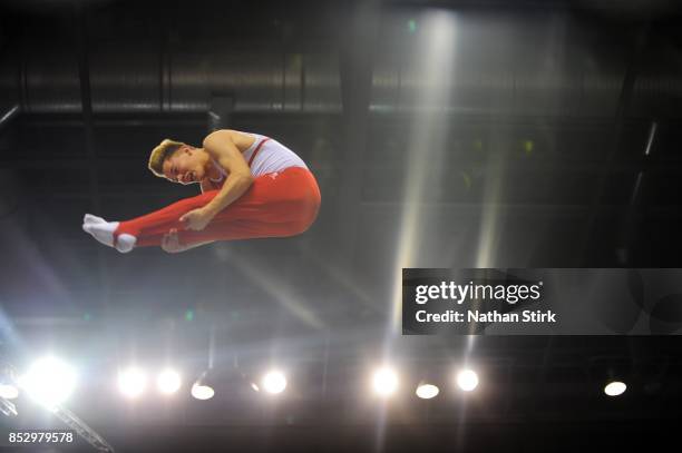 Jamie Gibney of Great Britain competes on the trampoline during the Trampoline, Tumbling & DMT British Championships at the Echo Arena on September...