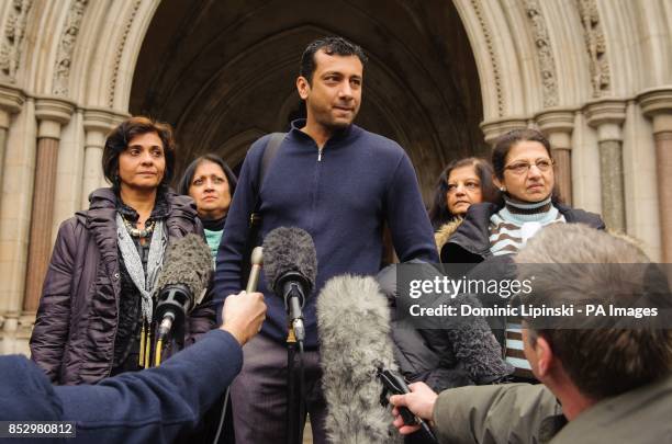 Amit Karia , the first cousin of Anni Dewani, who was shot in South Africa in 2010, stands alongside members of Anni Dewani's family as he speaks to...