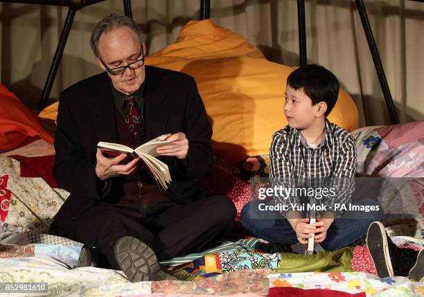 Nigel Planer reading to a group of children - all of whom are dyslexic and students with the charity Dyslexia Action - during the unveiling of a...