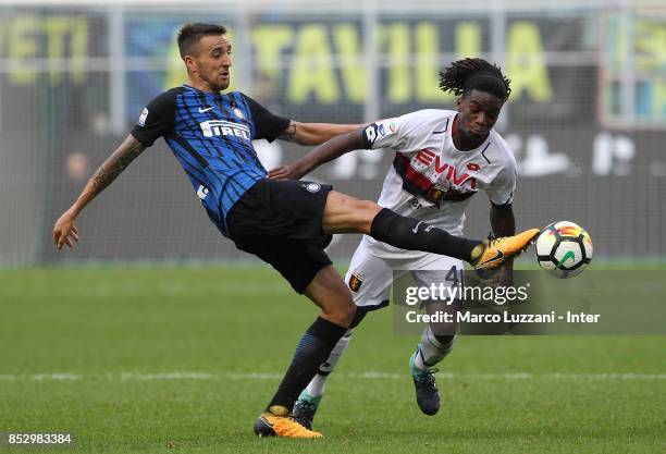 Matias Vecino of FC Internazionale competes for the ball with Isaac Cofiei of Genoa CFC during the Serie A match between FC Internazionale and Genoa...