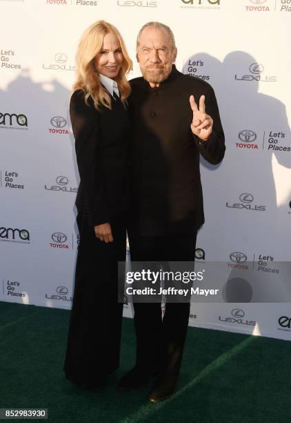 Actress Eloise Broady and Co-Founder John Paul Mitchell Systems John Paul DeJoria arrive at the 27th Annual EMA Awards at Barker Hangar on September...