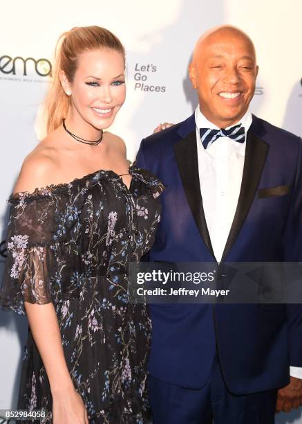 Model Kennedy Summers and entrepreneur-producer Russell Simmons arrive at the 27th Annual EMA Awards at Barker Hangar on September 23, 2017 in Santa...