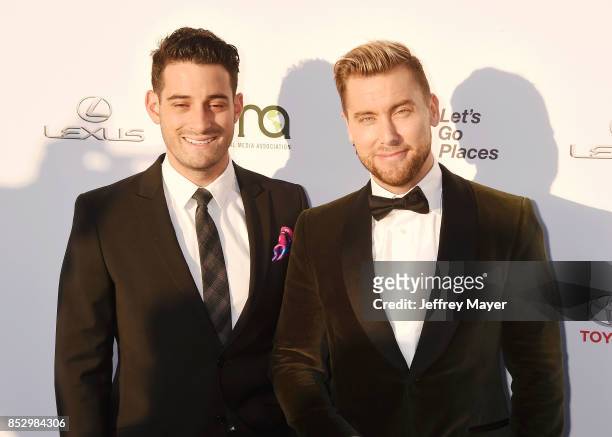 Actor Michael Turchin and singer-actor Lance Bass arrive at the 27th Annual EMA Awards at Barker Hangar on September 23, 2017 in Santa Monica,...