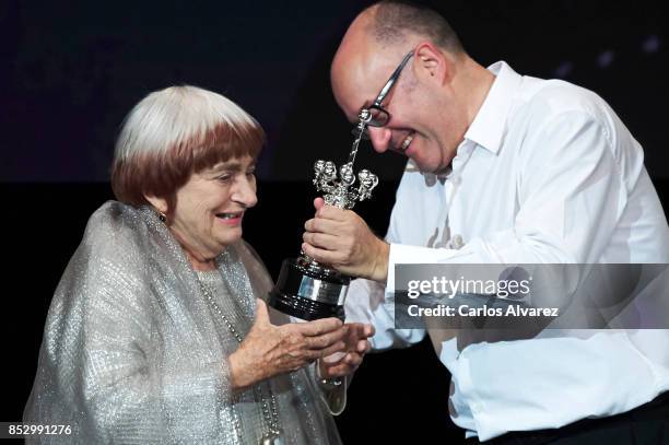 Director Agnes Varda receives from Jose Luis Rebordinos he Donosti Award during the 65th San Sebastian International Film Internacional Festival at...