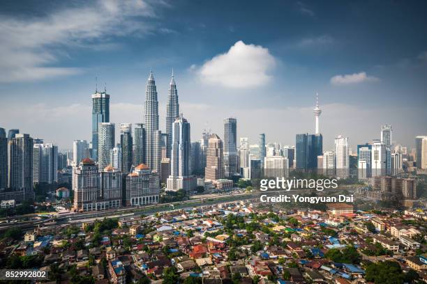 aerial view of kuala lumpur skyline - kuala lumpur stock pictures, royalty-free photos & images