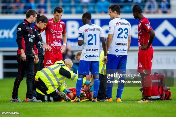 Julien De Sart midfielder of SV Zulte Waregem is injured and will be taken of the pitch during the Jupiler Pro League match between KAA Gent and SV...