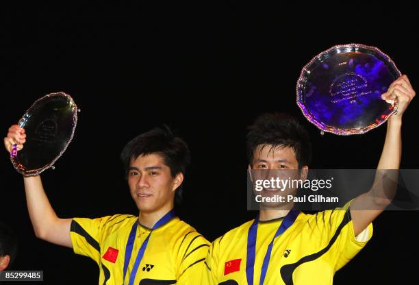 Cai Yun and Fu Haifeng of China celebrate winning the men's doubles final against Han Sang Hoon and Hwang Ji Man of Korea during the Yonex All...