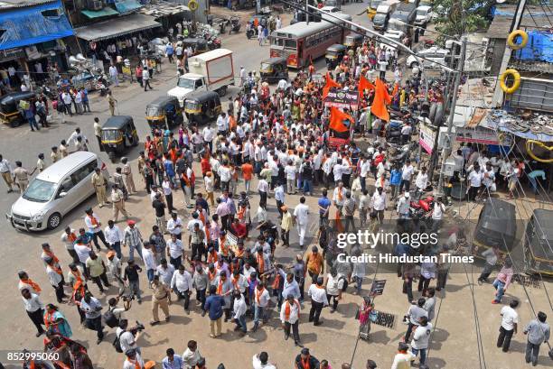 Shiv Sena activists protest against BJP government for the rising prices of petrol and diesel at Kurla, on September 23, 2017 in Mumbai, India. The...