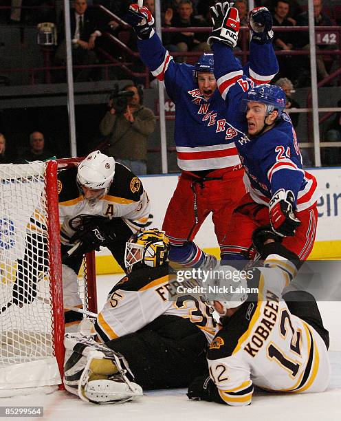 Ryan Callahan of the New York Rangers celebrates scoring the third goal in front of teammate Lauri Korpikoski against the Boston Bruins on March 8,...