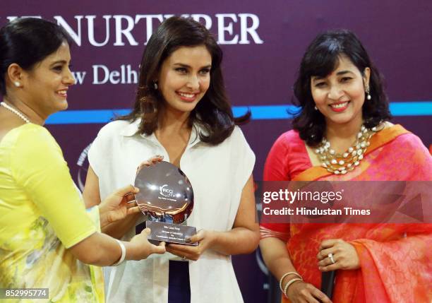 Bollywood actor Lisa Ray during a program "Call for Action: Expanding cancer care for women in India", on September 21, 2017 in New Delhi, India....