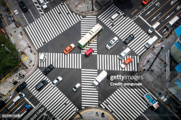 aerial view of a crossing in ginza - japanese bus stock pictures, royalty-free photos & images