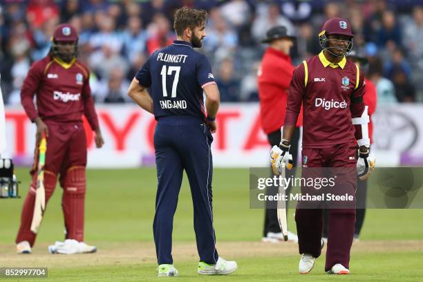 Marlon Samuels of West Indies heads back to the pavillion after being given out on review off the bowling of Liam Plunkett during the third Royal...