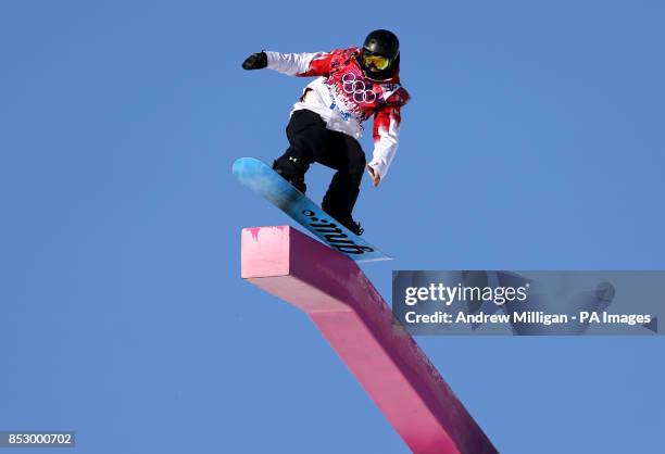 Competitor makes a jump during snowboard Slopestyle training at the Rosa Khutor Extreme Park during the 2014 Sochi Olympic Games in Krasnaya Polyana,...