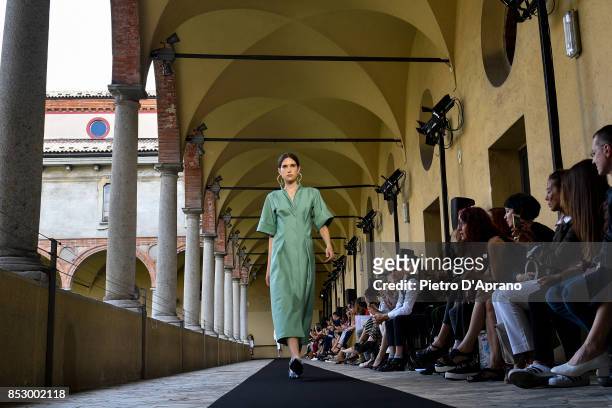 Model walks the runway at the Mila Schon show during Milan Fashion Week Spring/Summer 2018 on September 24, 2017 in Milan, Italy.