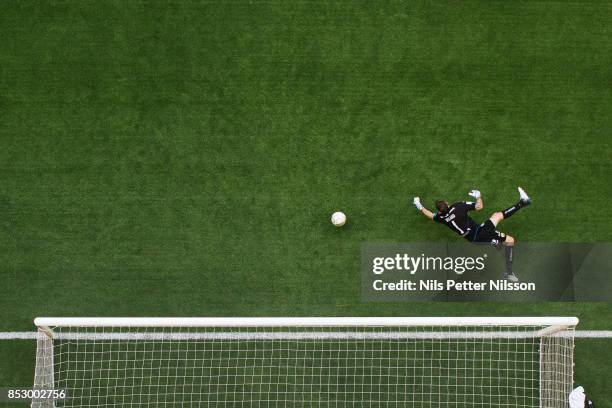 Johan Wiland, goalkeeper of Hammarby IF makes a save during the Allsvenskan match between Djurgardens IF and Hammarby IF at Tele2 Arena on September...