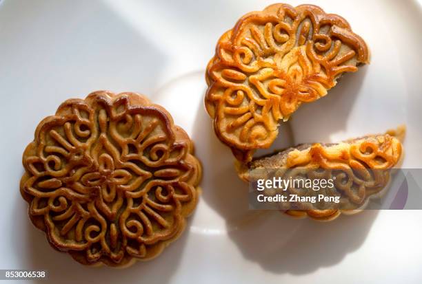 Moon cakes, arranged for photography. Mid-autumn festival is a Chinese traditional holiday and the moon cake is the main folk food of the holiday....