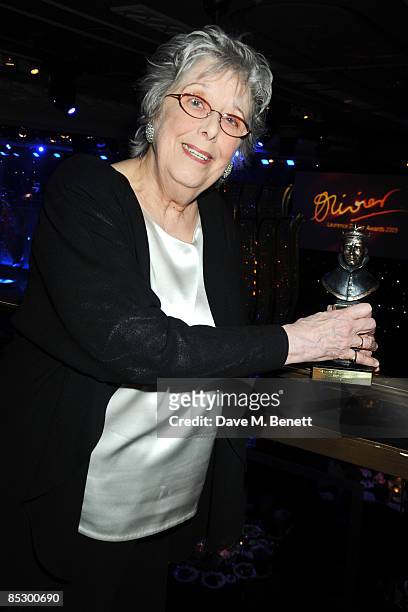 Margaret Tyzack poses with the Best Actress Award for The Chalk Garden during The Laurence Olivier Awards, at The Grosvenor House Hotel on March 8,...