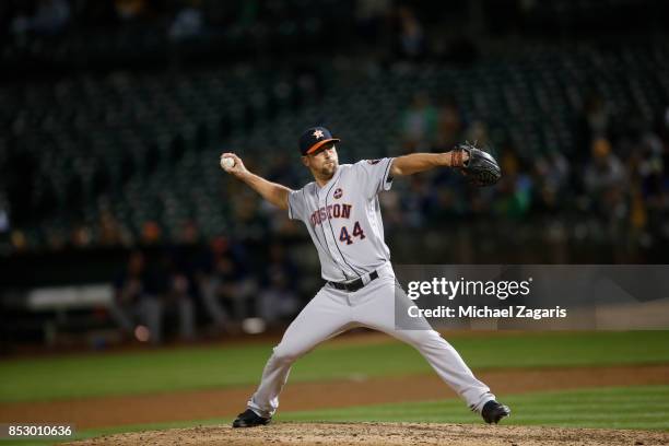 Luke Gregerson of the Houston Astros pitches during the game against the Oakland Athletics at the Oakland Alameda Coliseum on September 8, 2017 in...