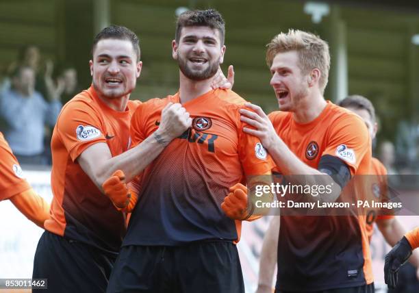 Dundee United's Nadir Ciftci celebrates his goal with team-mates Paul Paton and Stuart Armstrong during the Scottish Cup, Fifth Round match at...