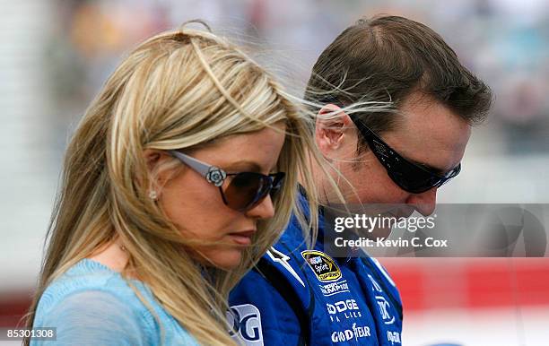 Kurt Busch, driver of the Miller Lite Dodge, and his wife Eva stand on pit road prior to the start of the NASCAR Sprint Cup Series Kobalt Tools 500...