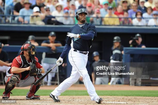 Ken Griffey Jr. #24 of the Seattle Mariners at bat during a Spring Training game against the Arizona Diamondbacks at Peoria Stadium on March 8, 2009...