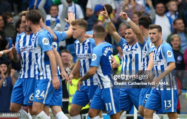 Tomer Hemed of Brighton and Hove Albion celebrates after he scores the opening goal during the Premier League match between Brighton and Hove Albion...