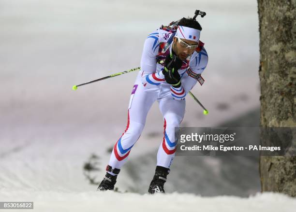 France's Martin Fourcade on his way to winning the Biathlon Men's 12.5km Pursuit at The Laura Cross-Country and Biathlon Centre during the 2014 Sochi...