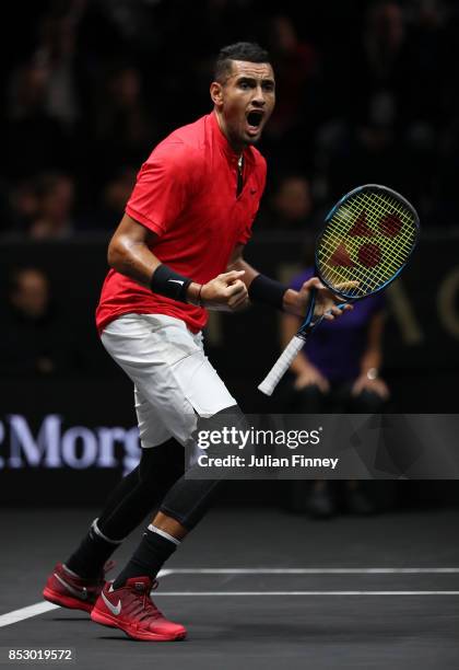 Nick Kyrgios of Team World celebrates winning a point during his mens singles match against Roger Federer of Team Europe on the final day of the...