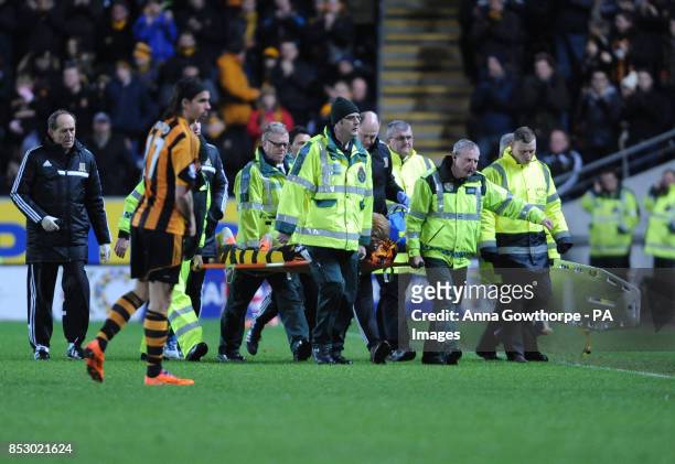 Hull City's Paul McShane is stretchered off injured during the Barclays Premier League match at the KC Stadium, Hull.